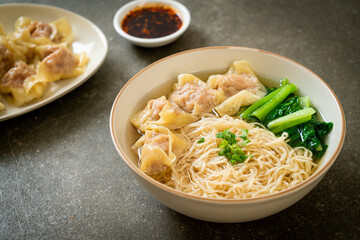 egg noodles with pork wonton soup or pork dumplings soup and vegetable