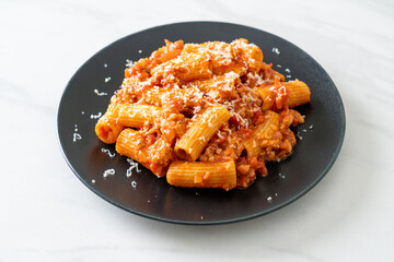 Rigatoni pasta bolognese with cheese