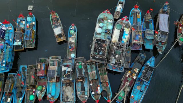 Vietnamese Fishing Trawlers Tied Together In Danang Harbour Drone Track Left