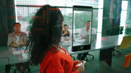 Portrait of hispanic businesswoman present start up marketing idea to investor. Female leader...