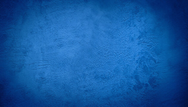 Abstract gradient bright blue background. Panoramic grunge navy blue stucco wall background. Beautiful Wide angle rough stylized texture wallpaper with copy space for design