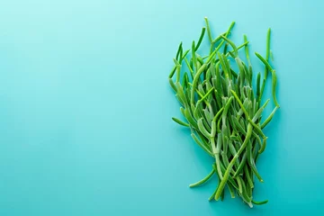 Crédence de cuisine en verre imprimé Turquoise Green Grass on Blue Background