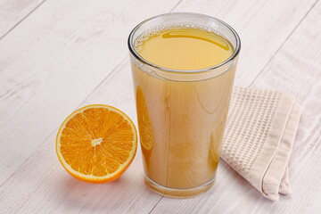 Sweet fresh orange juice in the glass