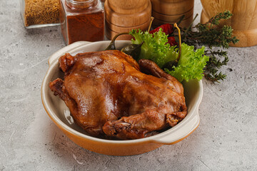 Baked small chicken with spices