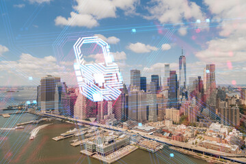A hologram of a fingerprint superimposed on the New York City skyline, with the concept of future...