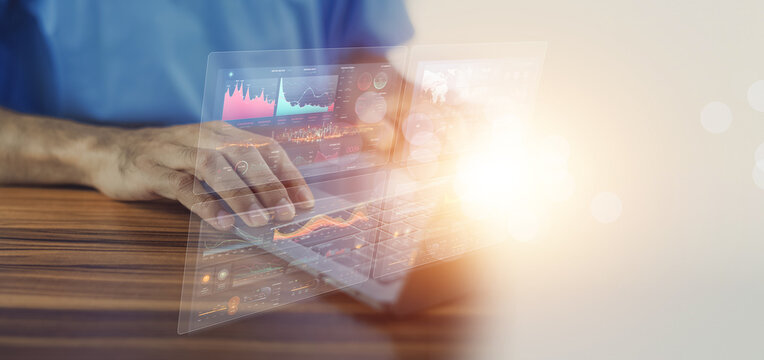 doctor uses a computer to analyze treatment data for sick people as well as check past treatment statistics in the database. To increase efficiency in treating patients