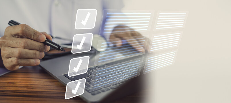 doctor uses a computer checklist to check and evaluate patient treatment. Health concept checklist
