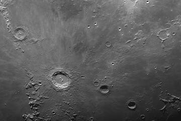 Surface of the moon. Astronomical photo through a telescope.