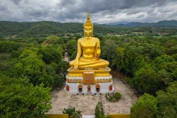 Big Gold Buddha statue at Wat Pha Thang, Uthai Thani, Thailand