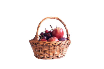 Wicker Basket Filled With Fruit on White Background. On a Transparent Background.