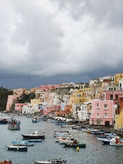 Obraz premium Coastal view of old historic Italian architecture. Traditional European old town buildings in Procida Island, Italy. Vacation travel background