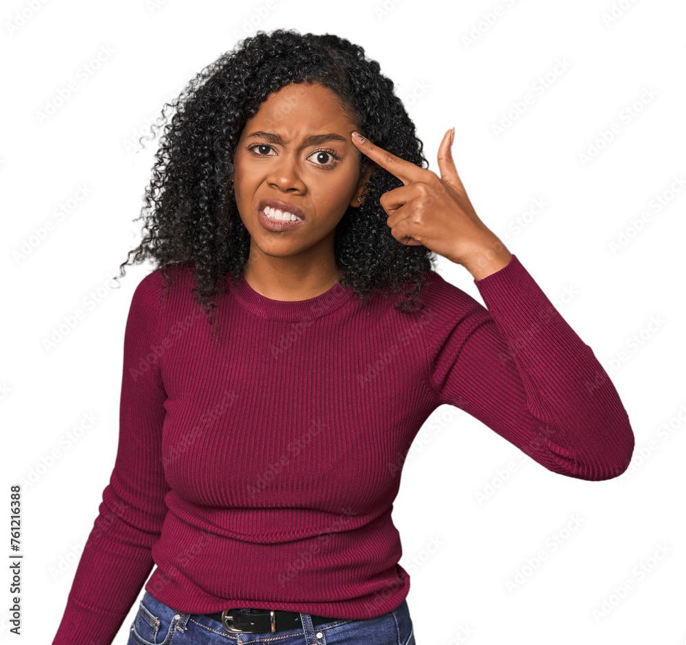 Wall mural african american woman in studio setting showing a disappointment gesture with forefinger.