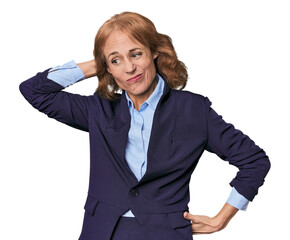 Mid-aged Caucasian businesswoman in blazer touching back of head, thinking and making a choice.