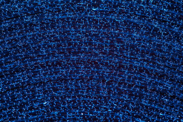 Niebieska błyszcząca struktura, granatowy kolor szpulka w zbliżeniu makro - obrazy, fototapety, plakaty