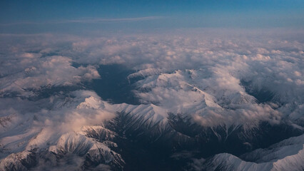 Mountains with snow from the plane