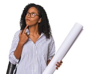 Young African American female architect with blueprint