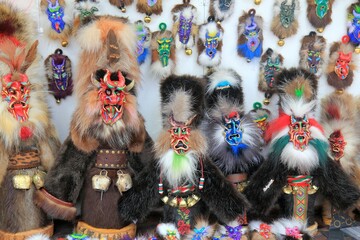Kuker masks, magnets and dolls in souvenir shops on 
