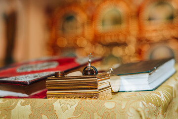 Church accessories, cross, book. bokeh