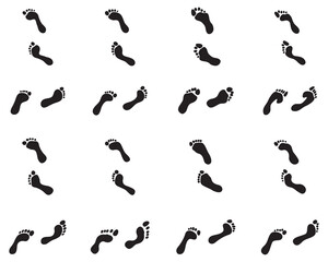 Black prints of human feet on a white background - 761236196
