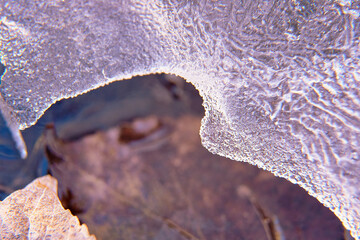 Detail of ice blocks, over mountain stream