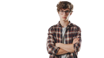 A man with glasses stands, arms crossed, looking contemplative