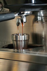 Espresso Machine Pouring Coffee Into a Cup