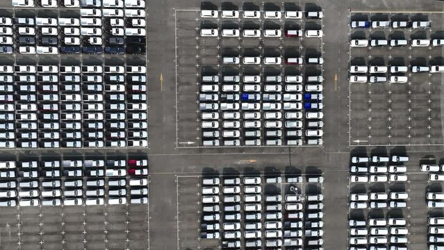 New automobiles background which lined up in the port for import and export business logistic to dealership for sale,Abovel view	