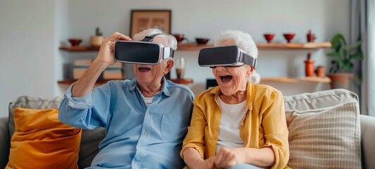 Fototapeta na wymiar Candid photo of a senior couple using virtual reality headsets in a cozy living room. The man and woman appear excited and amused, experiencing new technology while seated comfortably on a sofa.