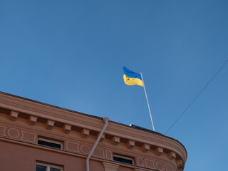 flag of Ukraine against blue sky