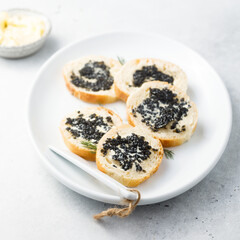 Black caviar on fresh baguette bread