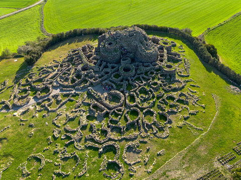 Aerial view with drone of the Nuragic archaeological complex of Su Nuraxi di Barumini. The Bronze Age fort, a UNESCO World Heritage Site. Barumini, Sardinia, Italy