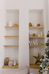 Beautiful minimalistic interior, bookshelf and decor