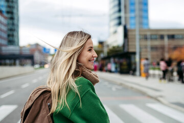 Nurse, doctor walking across city, going to work, hospital, clinic. Work-life balance of healthcare worker.