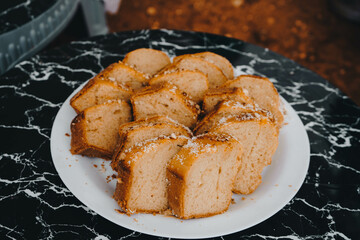  Morocco Homemade Lemon Pound cake slices on glass tray are  
