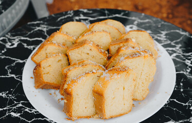  Morocco Homemade Lemon Pound cake slices on glass tray are  
