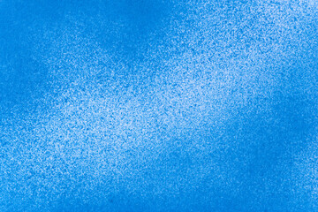 Fototapeta na wymiar スプレー塗料で塗られた青色の背景