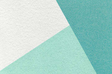 Texture of craft white, cyan and turquoise shade color paper background, macro. Vintage abstract...