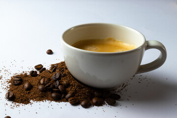 cup of coffee with beans