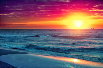 Seascape in the early morning. Colorful bright sunrise over the sea. Nature landscape