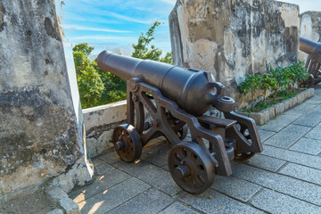 Old cannon with its barrel pointing towards the city on Monte Fortress (built between 1617-1626) on the tall Mount Hill,located directly east of the Ruins of St. Paul