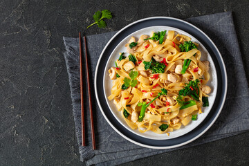 rice noodles with chicken, eggs, chinese broccoli