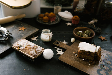 Beautiful details of a festive New Year's table with a Christmas cupcake