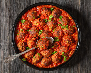 Albondigas, mexican meatballs in dish, top view