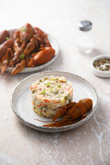 Traditional Russian salad with crawfish