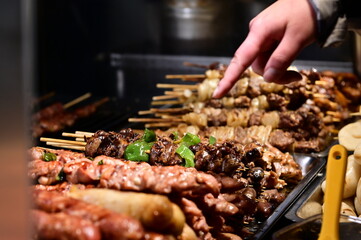 In Nanjichang Night Market, a spot known for its affordable and diverse food, this close-up...