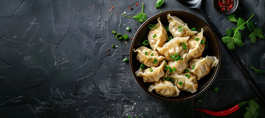 dumplings in a bowl sprinkled with green onions