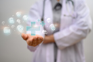 Doctor holding holding blue virtual plus sign. Health insurance and medical check up concept