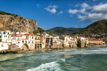 Cefalù is a coastal city in northern Sicily, Italy. Popular beach. Summer time.