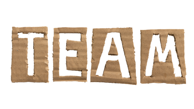 A word "TEAM" crafted from a cardboard
