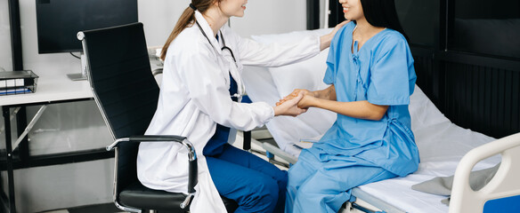 Woman Doctor and patient discussing something while sitting at the table . Medicine and health care concept.
